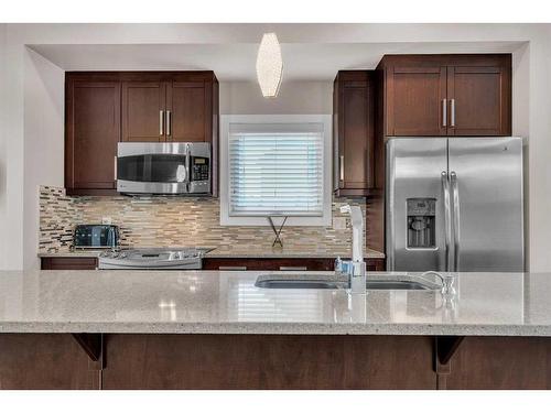 49 Sage Meadows Terrace Nw, Calgary, AB - Indoor Photo Showing Kitchen With Double Sink With Upgraded Kitchen