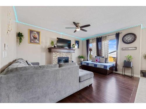 545 Saddlelake Drive Ne, Calgary, AB - Indoor Photo Showing Living Room With Fireplace