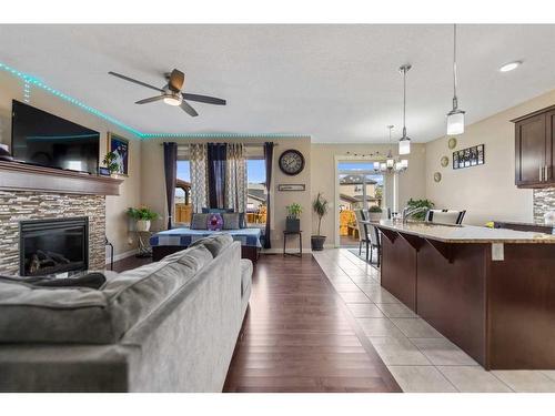 545 Saddlelake Drive Ne, Calgary, AB - Indoor Photo Showing Living Room With Fireplace