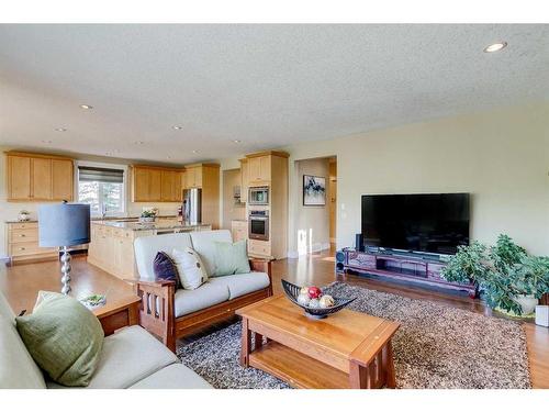 521 Aspen Glen Place Sw, Calgary, AB - Indoor Photo Showing Living Room