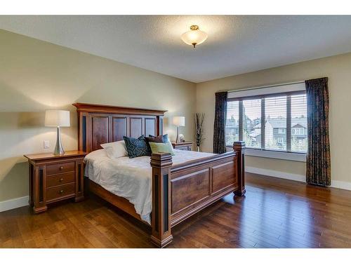 521 Aspen Glen Place Sw, Calgary, AB - Indoor Photo Showing Bedroom