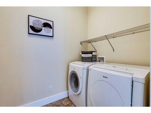 521 Aspen Glen Place Sw, Calgary, AB - Indoor Photo Showing Laundry Room