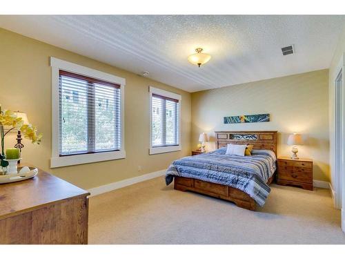 521 Aspen Glen Place Sw, Calgary, AB - Indoor Photo Showing Bedroom