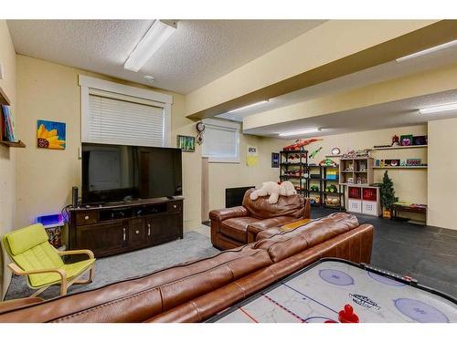 521 Aspen Glen Place Sw, Calgary, AB - Indoor Photo Showing Basement