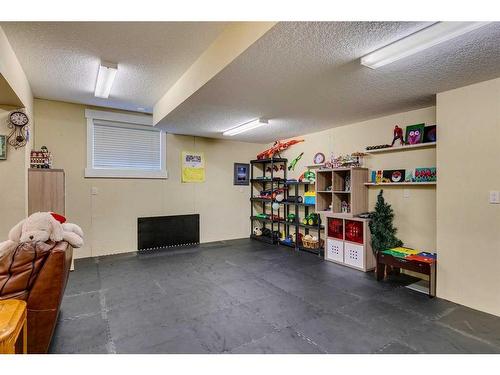 521 Aspen Glen Place Sw, Calgary, AB - Indoor Photo Showing Basement