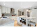 5970 Signal Ridge Heights Sw, Calgary, AB  - Indoor Photo Showing Kitchen With Double Sink With Upgraded Kitchen 