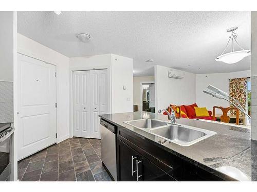 2417-81 Legacy Boulevard Se, Calgary, AB - Indoor Photo Showing Kitchen With Double Sink