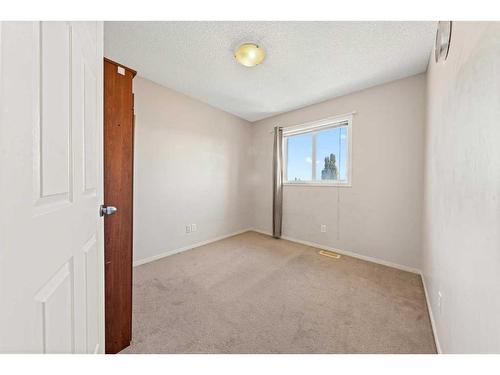 140 Eversyde Boulevard Sw, Calgary, AB - Indoor Photo Showing Other Room