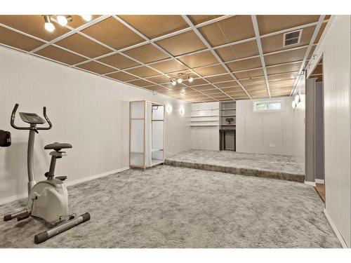 4832 26 Avenue Ne, Calgary, AB - Indoor Photo Showing Gym Room