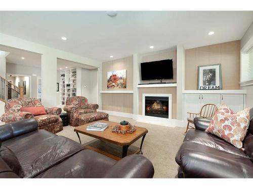 249 Elbow Ridge Haven, Rural Rocky View County, AB - Indoor Photo Showing Living Room With Fireplace