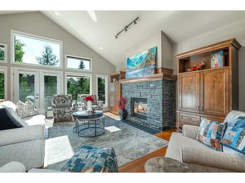 249 Elbow Ridge Haven, Rural Rocky View County, AB - Indoor Photo Showing Living Room With Fireplace