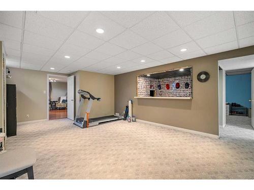 12207 Lake Fraser Way Se, Calgary, AB - Indoor Photo Showing Gym Room