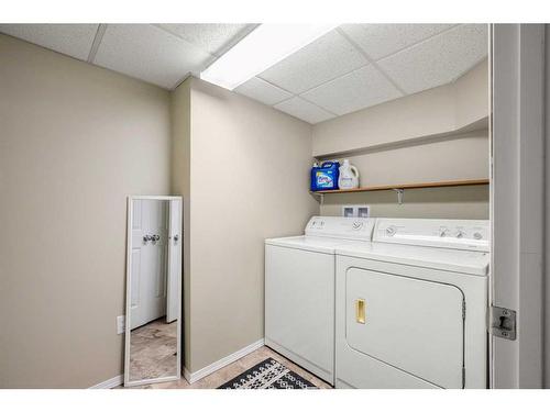 12207 Lake Fraser Way Se, Calgary, AB - Indoor Photo Showing Laundry Room