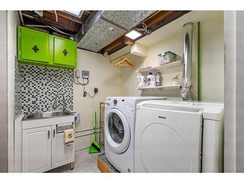 12207 Lake Fraser Way Se, Calgary, AB - Indoor Photo Showing Laundry Room