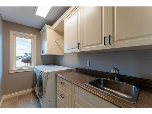 123 Arbour Crest Rise Nw, Calgary, AB - Indoor Photo Showing Laundry Room