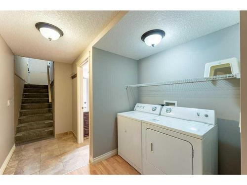 123 Arbour Crest Rise Nw, Calgary, AB - Indoor Photo Showing Laundry Room