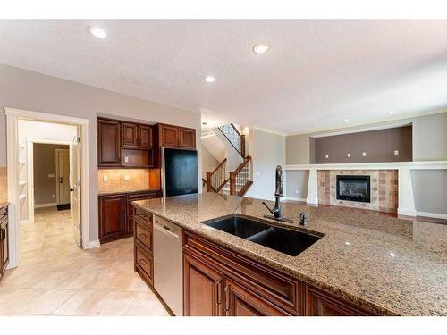 123 Arbour Crest Rise Nw, Calgary, AB - Indoor Photo Showing Kitchen With Double Sink