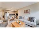 213-214 Sherwood Square Nw, Calgary, AB  - Indoor Photo Showing Living Room 