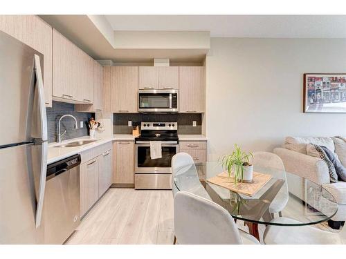 213-214 Sherwood Square Nw, Calgary, AB - Indoor Photo Showing Kitchen With Stainless Steel Kitchen