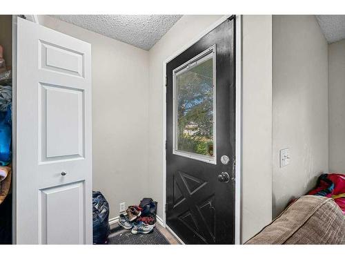 21 Cedarwood Hill Sw, Calgary, AB - Indoor Photo Showing Other Room