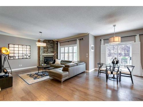 51 Evergreen Manor Sw, Calgary, AB - Indoor Photo Showing Living Room With Fireplace