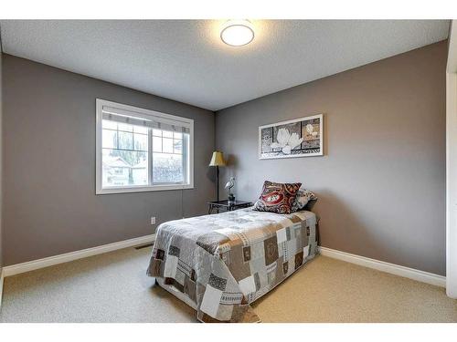 51 Evergreen Manor Sw, Calgary, AB - Indoor Photo Showing Bedroom