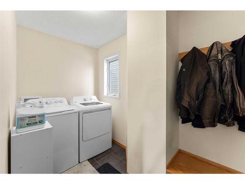 268 Rocky Ridge Bay Nw, Calgary, AB - Indoor Photo Showing Laundry Room