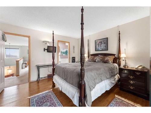 268 Rocky Ridge Bay Nw, Calgary, AB - Indoor Photo Showing Bedroom