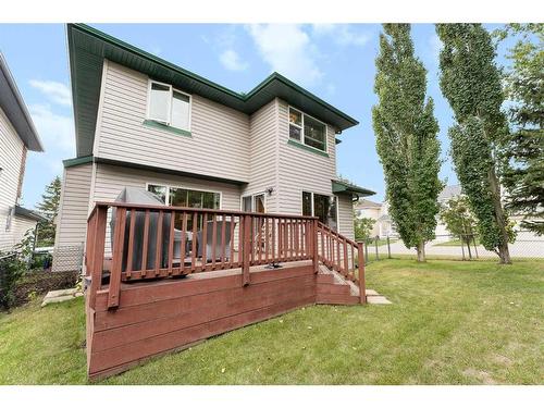 268 Rocky Ridge Bay Nw, Calgary, AB - Outdoor With Deck Patio Veranda With Exterior