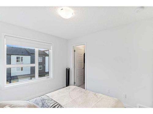 275 Redstone Boulevard Ne, Calgary, AB - Indoor Photo Showing Bedroom