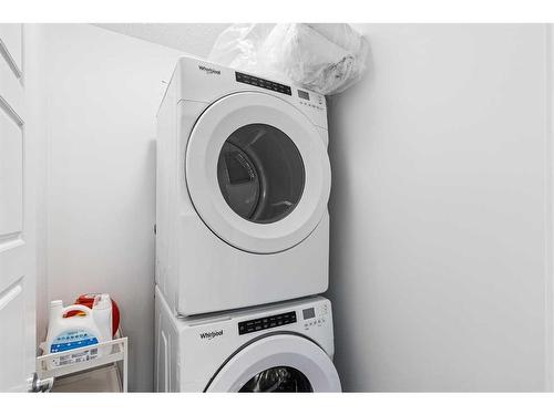 275 Redstone Boulevard Ne, Calgary, AB - Indoor Photo Showing Laundry Room