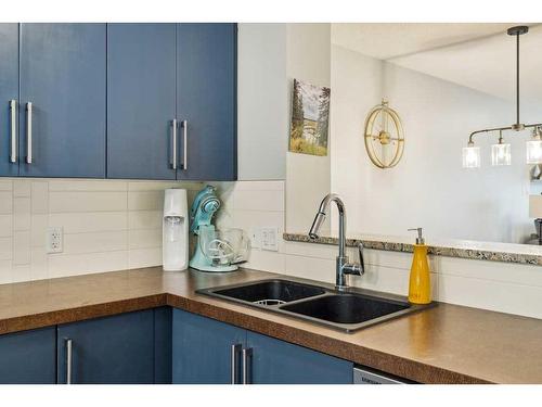 89 Aspen Hills Drive Sw, Calgary, AB - Indoor Photo Showing Kitchen With Double Sink