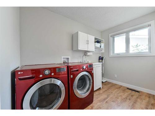 5128 Viceroy Drive Nw, Calgary, AB - Indoor Photo Showing Laundry Room