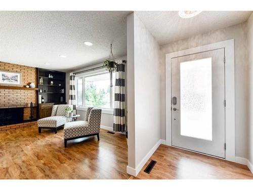 5128 Viceroy Drive Nw, Calgary, AB - Indoor With Fireplace