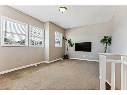 47 Panamount Road Nw, Calgary, AB - Indoor Photo Showing Living Room With Fireplace