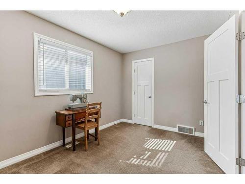 47 Panamount Road Nw, Calgary, AB - Indoor Photo Showing Living Room