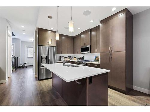 2014 35 Avenue Sw, Calgary, AB - Indoor Photo Showing Kitchen With Stainless Steel Kitchen With Double Sink With Upgraded Kitchen