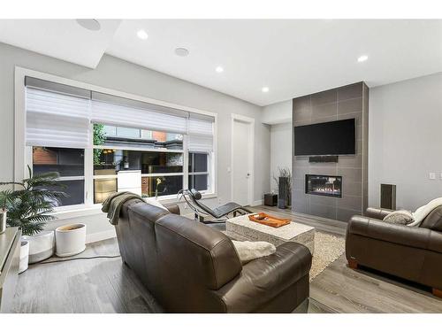 2014 35 Avenue Sw, Calgary, AB - Indoor Photo Showing Living Room With Fireplace