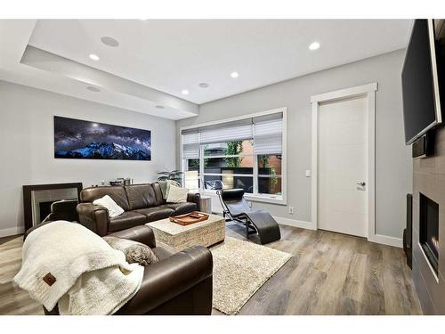 2014 35 Avenue Sw, Calgary, AB - Indoor Photo Showing Living Room With Fireplace