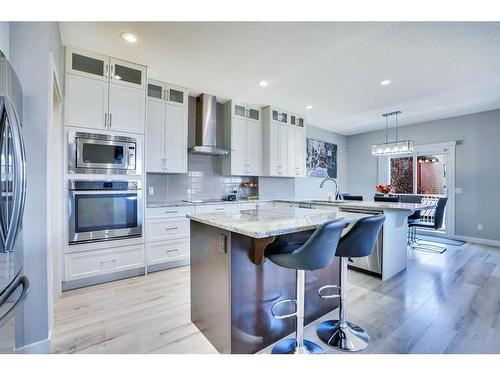 7 Kingsbury Close Se, Airdrie, AB - Indoor Photo Showing Kitchen With Upgraded Kitchen