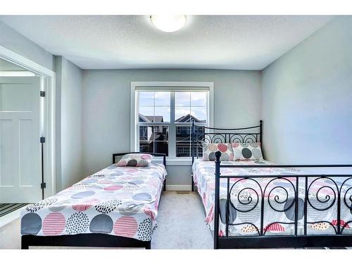 7 Kingsbury Close Se, Airdrie, AB - Indoor Photo Showing Bedroom