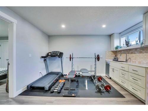 7 Kingsbury Close Se, Airdrie, AB - Indoor Photo Showing Gym Room