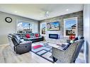 7 Kingsbury Close Se, Airdrie, AB  - Indoor Photo Showing Living Room With Fireplace 