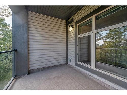 110-45 Aspenmont Heights Sw, Calgary, AB - Outdoor With Balcony With Exterior