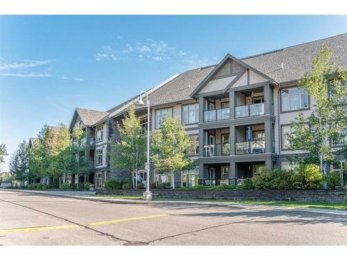 110-45 Aspenmont Heights Sw, Calgary, AB - Outdoor With Balcony With Facade