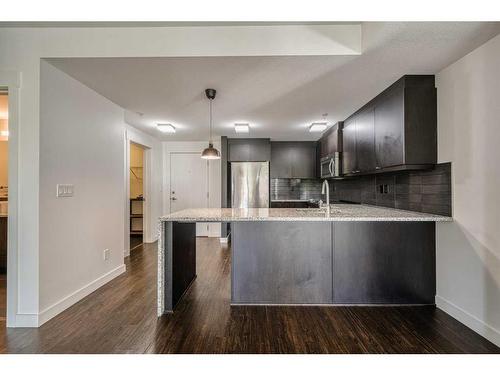 110-45 Aspenmont Heights Sw, Calgary, AB - Indoor Photo Showing Kitchen With Upgraded Kitchen