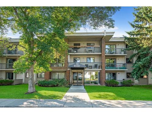 309-2611 1 Avenue Nw, Calgary, AB - Outdoor With Balcony With Facade