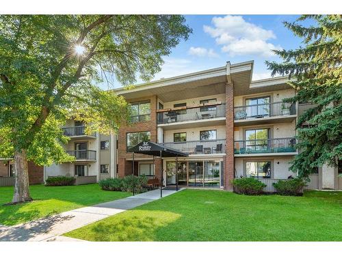 309-2611 1 Avenue Nw, Calgary, AB - Outdoor With Balcony With Facade