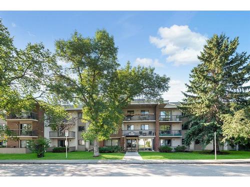 309-2611 1 Avenue Nw, Calgary, AB - Outdoor With Balcony With Facade