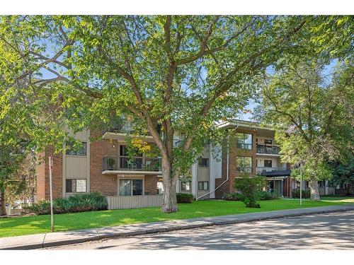 309-2611 1 Avenue Nw, Calgary, AB - Outdoor With Balcony With Facade